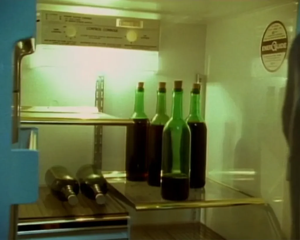 Forever Knight S1E1: "Dark Knight (Part 1)" Review featuring Nick Knight's refrigerator with blood-filled wine bottles on Pop the Channel