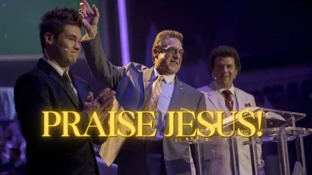 The Righteous Gemstones S1E1 Review: "The Righteous Gemstones" featured image of Kelvin, Eli, and Jesse on stage with the text overlay of "Praise Jesus" on Pop the Channel.
