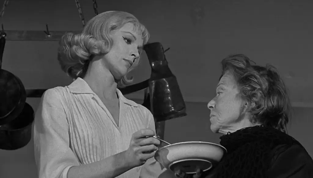 Homicidal Review: William Castle's Bizarro Psycho Is a Hell of a Lot More Fun 4 Homicidal 1961 Movie Review featuring Emily feeding Helga warm milk on Pop the Channel