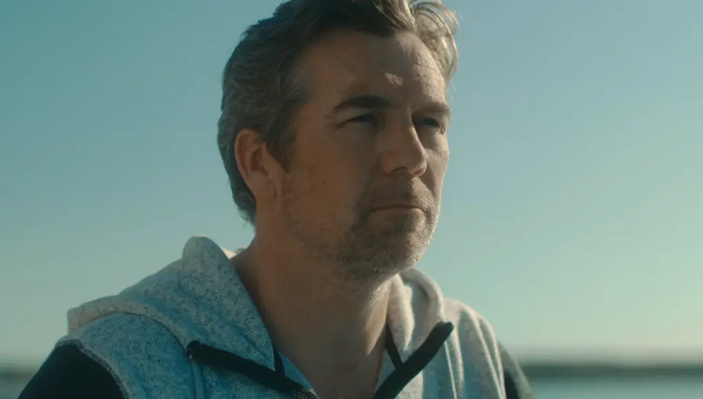 Last Seen Season 1 Episode 6: "The Choice" Review featuring Ian at the beach looking at the calm sea after Bill's memorial on Pop the Channel