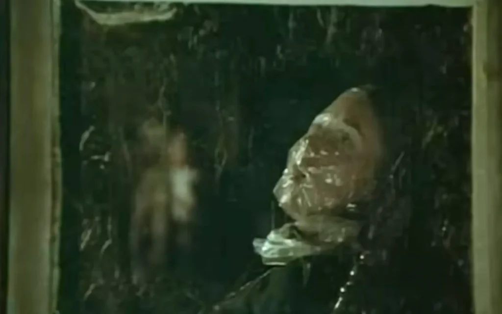 13 Slasher Movies to Watch If You Like Crystal Lake featuring a still from the 1974 film Black Christmas on Pop the Channel