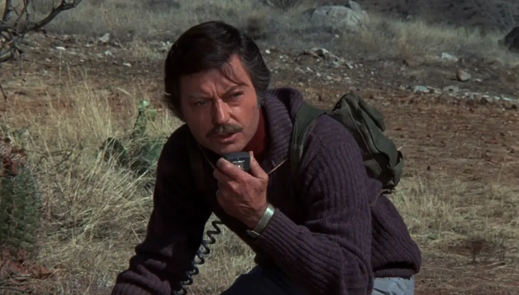 Star Trek Actors in Weird 70s Movies featuring Elgin Clark talking on a handheld radio in 1972 Night of the Lepus Pop the Channel